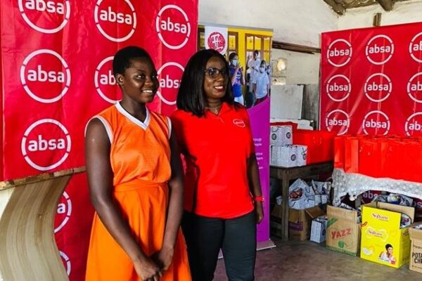 Ms. Annie Aborah, the Chairperson of Absa Bank Women in Risk , engaging with a student of New Universal Preparatory School